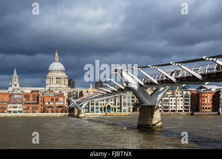 View of Millennium Bridge and River Thames looking towards St Paul's Cathedral, London, England, UK