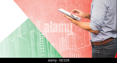 Composite image of businessman using digital tablet over white background Stock Photo