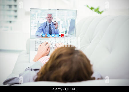 Composite image of doctor holding medicine jar Stock Photo