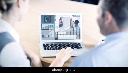 Composite image of screen with graphs Stock Photo