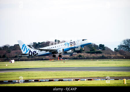 Flybe Airline Embraer 175-ST Airliner G-FBJB Taking Off at Manchester International Airport England United Kingdom UK Stock Photo