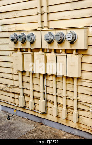 Electric Meters On Side of Old House Converted to Apartments Stock Photo
