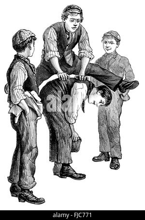 Black and white engraving of Victorian or Edwardian boys playing leapfrog. Stock Photo