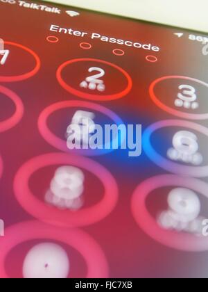 Apple Iphone lock screen with enter passcode instruction Stock Photo