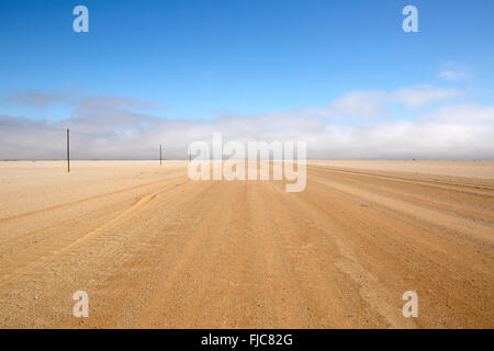 Desert road in Namibia. Stock Photo