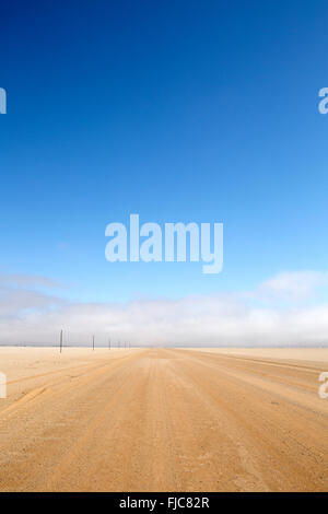 Desert road in Namibia. Stock Photo