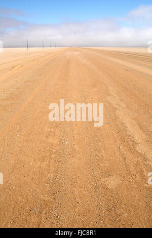 Desert road in Namibia. Stock Photo