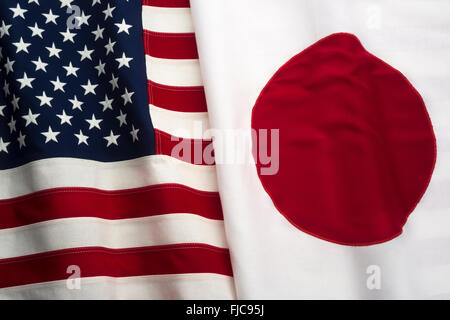 FLAGS OF UNITED STATES OF AMERICA AND JAPAN MADE OF STITCHED COTTON BUNTING Stock Photo