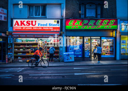 Archway corner shops, evening, north London Stock Photo