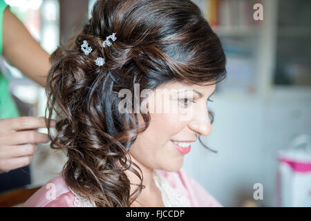 hairstyle of girl with hair clips Stock Photo