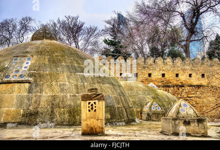 Round roofs of ancient public baths in Baku Stock Photo