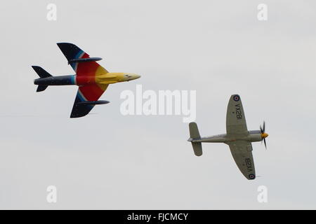 An interesting formation of two Hawker classics, the propeller driven Sea Fury and the subsonic Hunter jet. Stock Photo