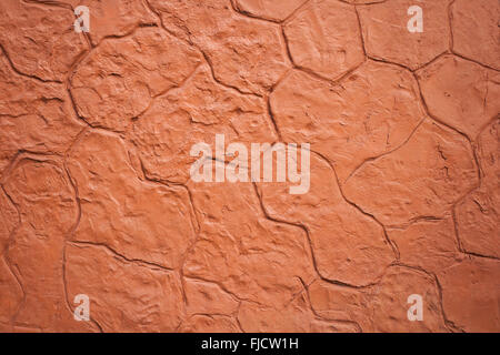 concrete stamp wall background with orange color Stock Photo