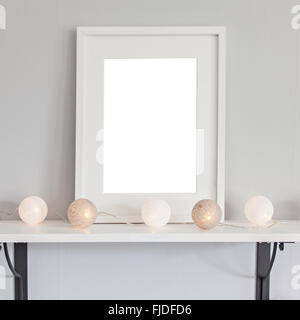 Image of a mockup scene with vertical white frame, and baubles. Stock Photo