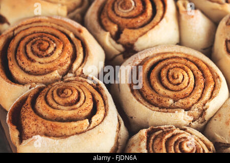 Fresh baked at home cinnamon rolls pastry dessert. Shallow depth of field. Stock Photo