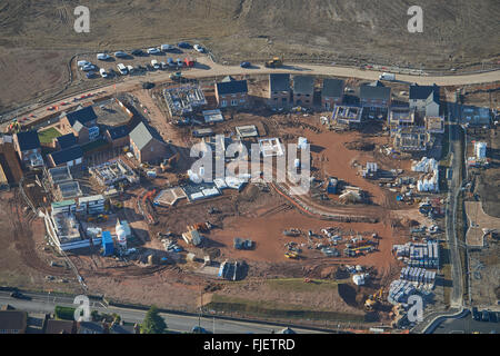 An aerial view of a new housing development under construction on an old factory site, Rogerstone, Newport Stock Photo
