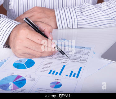 Analysts are presenting information to investors. Stock Photo