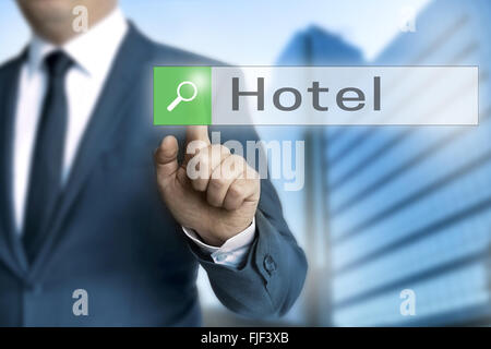 hotel browser is operated by businessman. Stock Photo