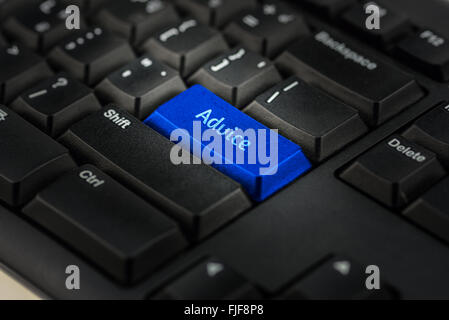 Close-up view on conceptual keyboard - advice(blue key) Stock Photo