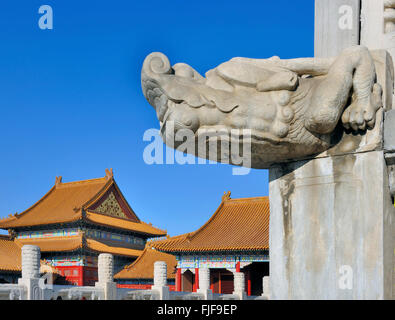 White marble gargoyle in the Forbidden City, Beijing,China against clear blue sky. Stock Photo
