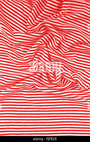 Striped wrinkled red and white zebra fabric cloth background Stock Photo