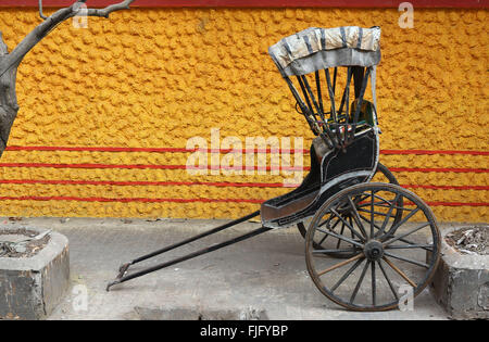 India, 20 February 2016. A hand-pulled rickshaw stands Kolkata. Photo by Palash Khan Stock Photo