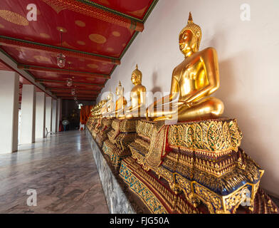 Golden Buddha statues, Wat Pho temple, Wat Phra Chetuphon, Bangkok, Thailand Stock Photo