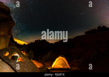 Tent on a campsite with starry sky above, night scene, Wildrose Campground, Death Valley National Park, California, USA Stock Photo
