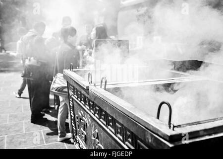 Worshippers at Lama Temple Stock Photo