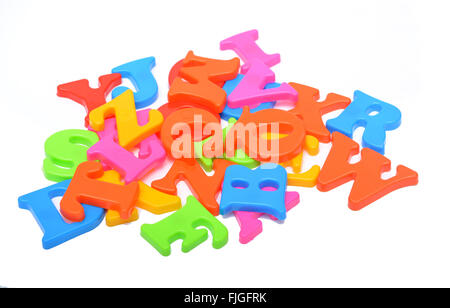 Colorful Alphabets closeup isolated on white background. Stock Photo