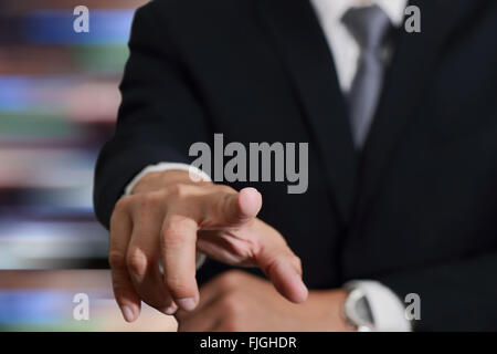 Businessman hand touching empty virtual screen, modern business background concept - can be used for montage your text Stock Photo