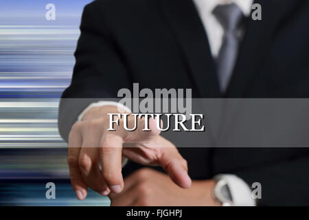 Businessman hand touching future sign on virtual screen. Stock Photo