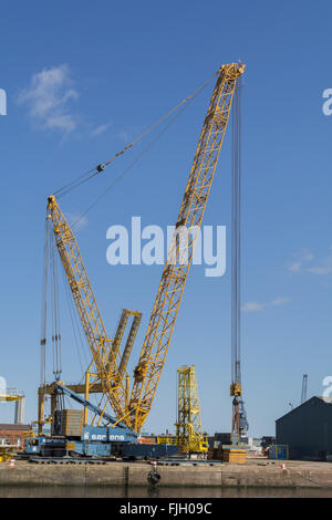 Heavy lifting cranes on the quayside at Leith Docks, Edinburgh. Stock Photo