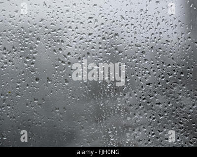 Rain drops on a window glass in Stock Photo