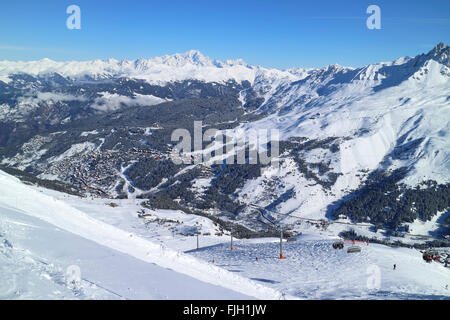 Ski village of Meribel in French Alps Three valleys ski resort, with ski slopes, lifts, chalets Stock Photo