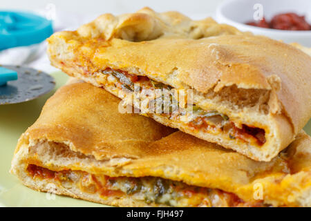 Calzone - Italian Oven-Baked Filled Pizza Stock Photo