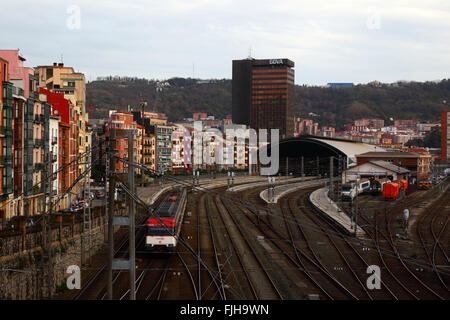 Renfe electric passenger train approaching Estacion Abando Indalecio Prieto / Bilbao-Abando railway station, Bilbao, Basque Country, Spain Stock Photo