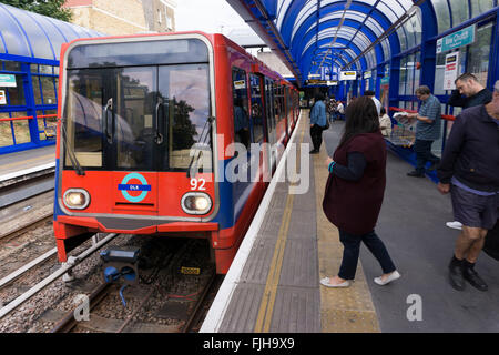 DLR train pulling in to Bow Church station in the East End, London, UK. The Docklands Light Railway is an automated light metro system opened in 1987 to serve the redeveloped Docklands area of London. Stock Photo