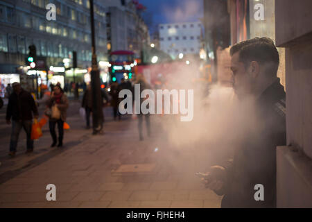 Man vaping on the street Stock Photo Alamy