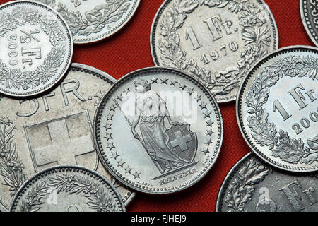 Coins of Switzerland. Standing Helvetia depicted in the Swiss one franc coin. Stock Photo