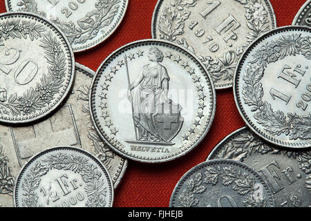 Coins of Switzerland. Standing Helvetia depicted in the Swiss one franc coin. Stock Photo