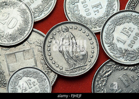 Coins of Switzerland. Standing Helvetia depicted in the Swiss one franc coin. Stock Photo