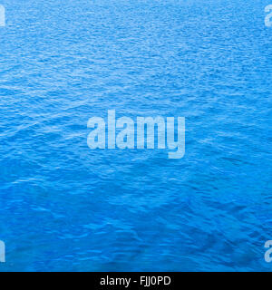 Blue water surface background, texture or pattern Stock Photo