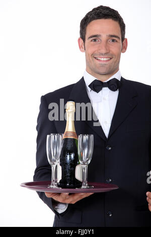 Smart waiter holding tray Stock Photo