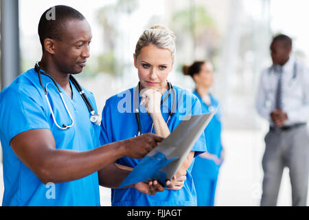 professional doctors studying x-ray film Stock Photo