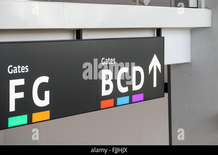 Departure Gates Signs In Airport Terminal Stock Photo