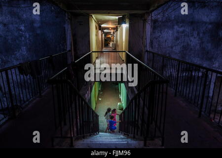 Phnom Penh, Cambodia. 4th Mar, 2015. By early evening the corridors are empty. The multiple apartment block was built to house artists and low-income workers in the time of Cambodian urbanization in early 1960's, has been a place of creativity, inspiration and extremes, but is now stigmatized by poverty, crime, drugs and prostitution. © Tariq Zaidi/ZUMA Wire/ZUMAPRESS.com/Alamy Live News Stock Photo