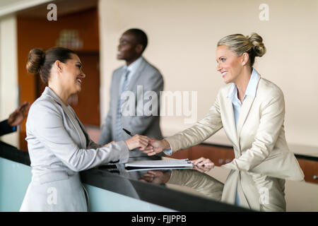 businessman check in at hotel reception Stock Photo