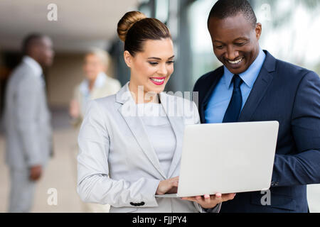 portrait of successful business executive using laptop computer Stock Photo