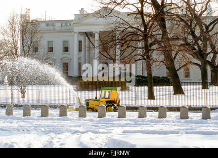 Washington, DC., USA, 8th January, 1996 The Blizzard of 1996 was a severe nor'easter that paralyzed the U.S. East Coast with up to 4 feet  of wind-driven snow from January 6 to January 8, 1996. It is one of only two snowstorms to receive the top rating of 5, or 'Extreme', on the Northeast Snowfall Impact Scale. Snowplows clearing the sidewalks and driveways around the White House after the blizzard. Credit: Mark Reinstein Stock Photo